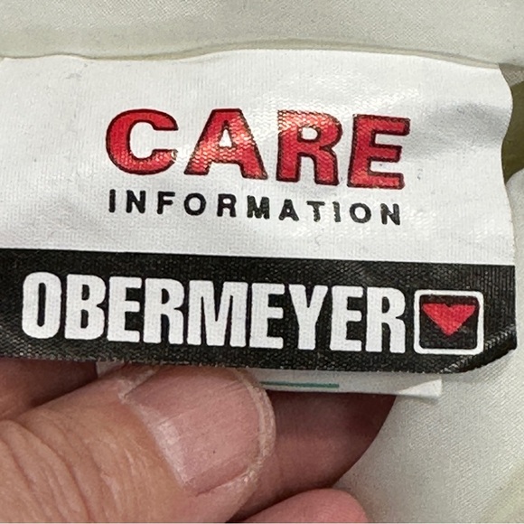 Obermeyer white stirrup ski pants, size 8 short, polyester and nylon - Picture 12 of 14